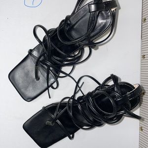 Black strap heels